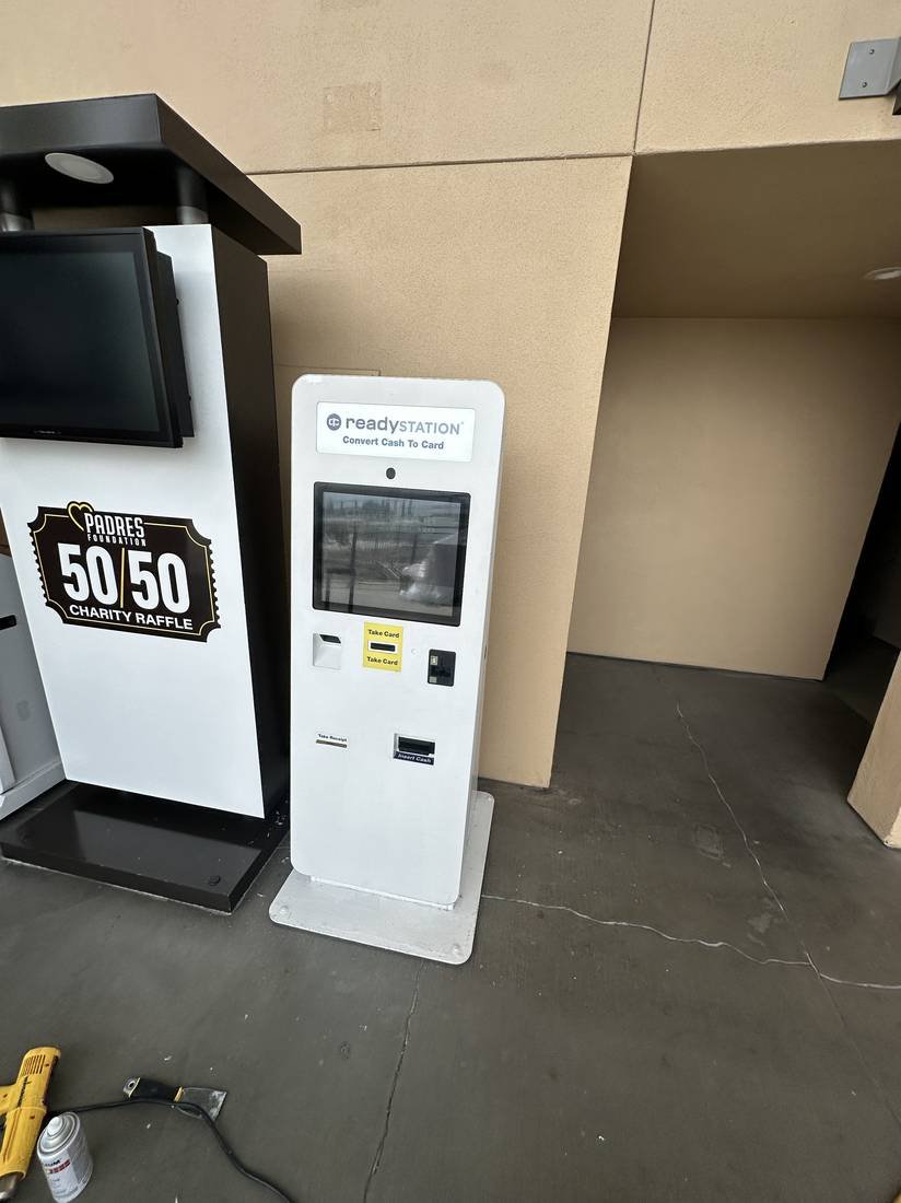 Payment and charity raffle kiosks serviced on site