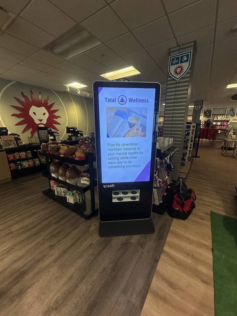 Freestanding interactive kiosk on a retail floor