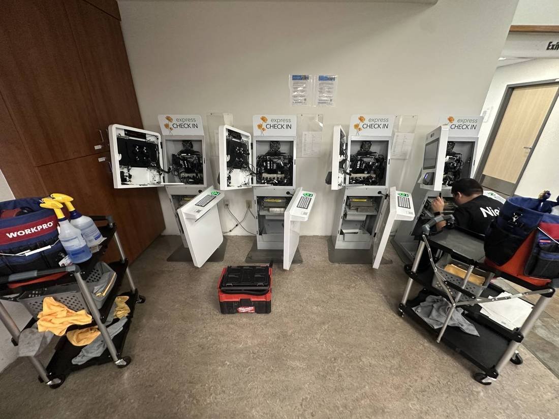 Servicing a bank of patient check-in kiosks at a medical campus