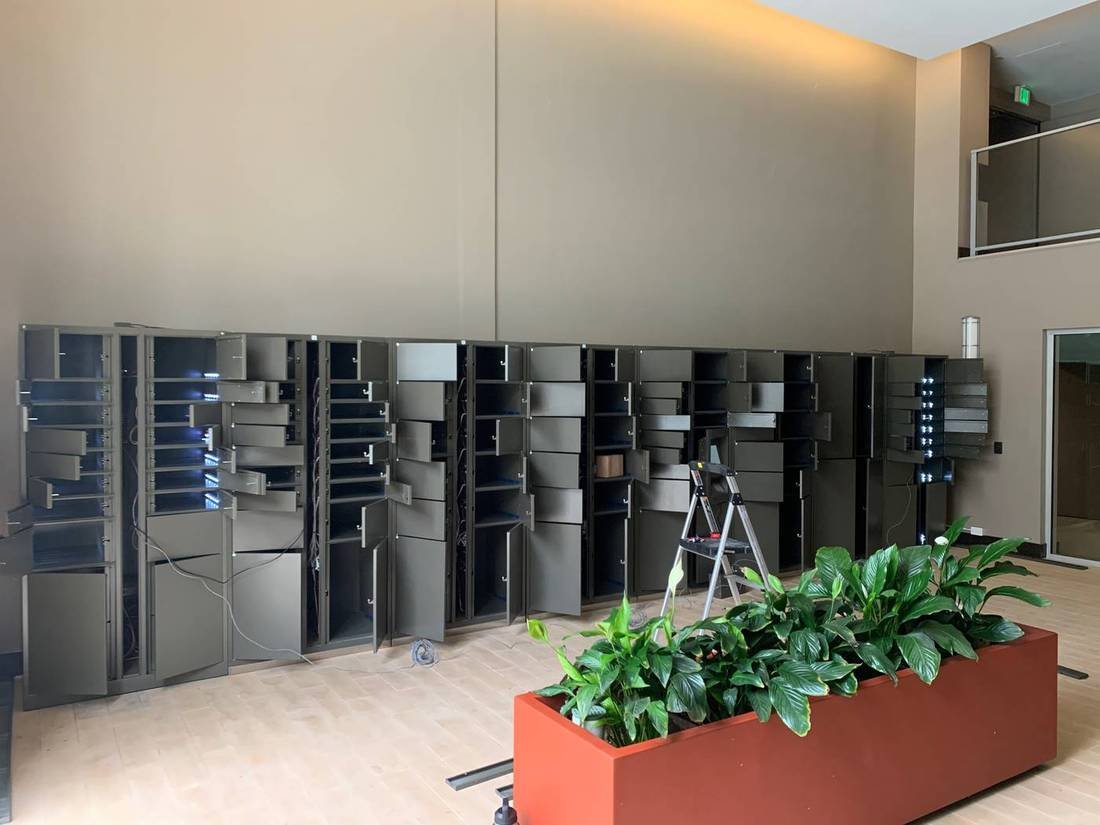 Large multi-column locker installation in a lobby