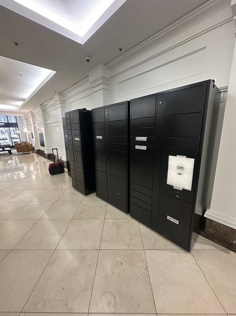 Locker bank installed along a building corridor