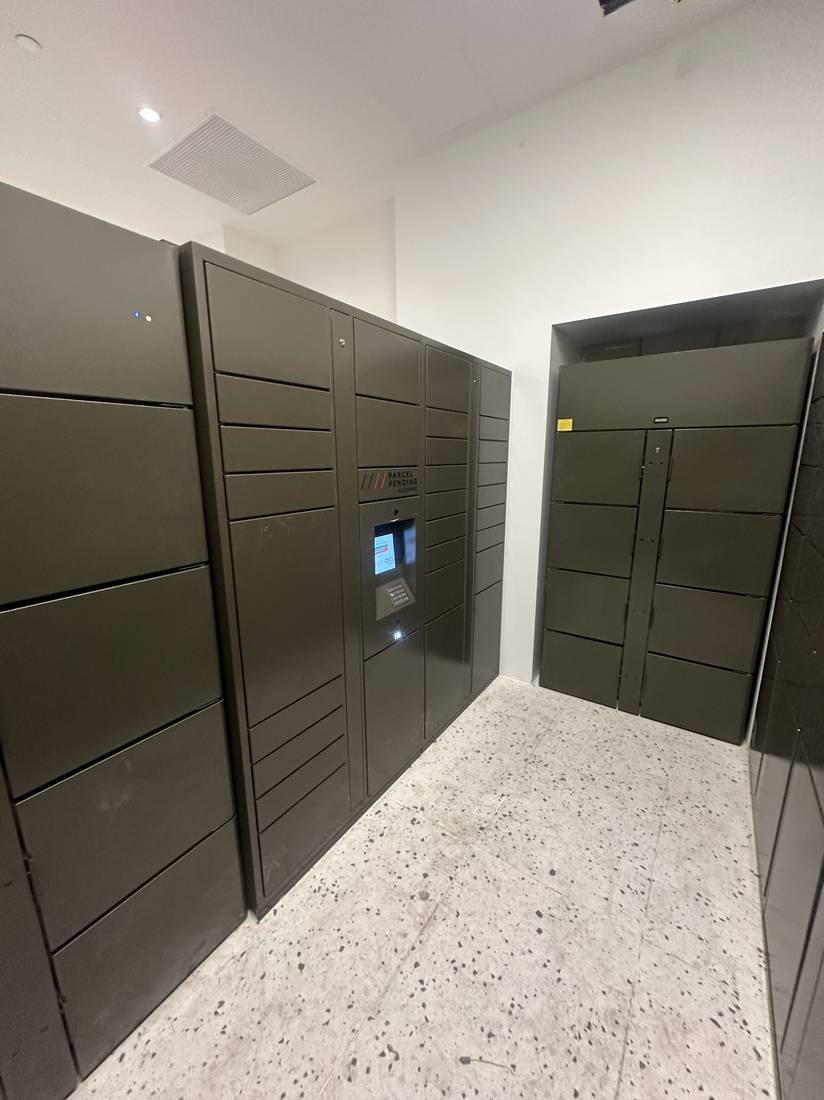 Dual locker banks serving a residential hallway