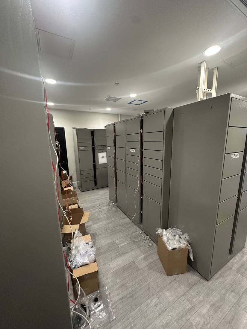 Locker modules mid-installation and being commissioned