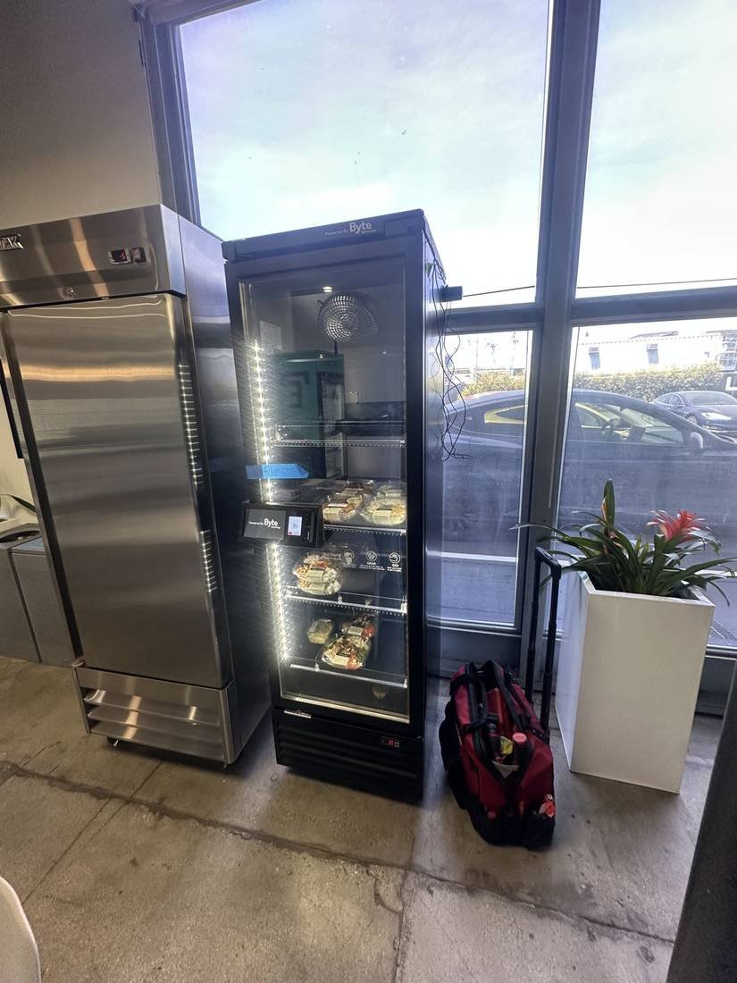 Refrigerated smart cooler installed and stocked
