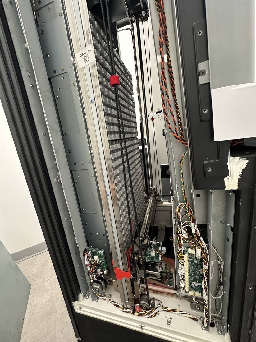 Internal rails, motors, and control boards in a dispensing unit