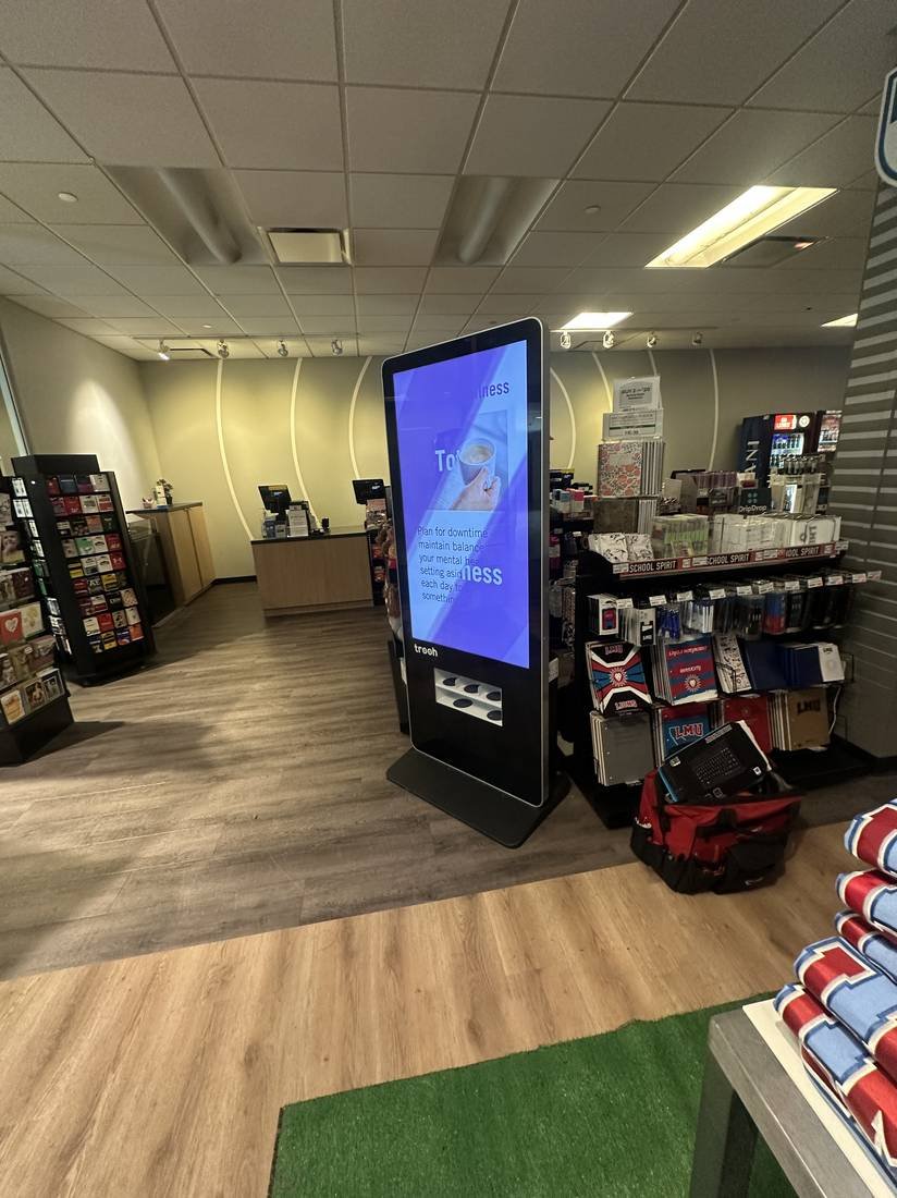 Interactive wayfinding kiosk on a retail floor