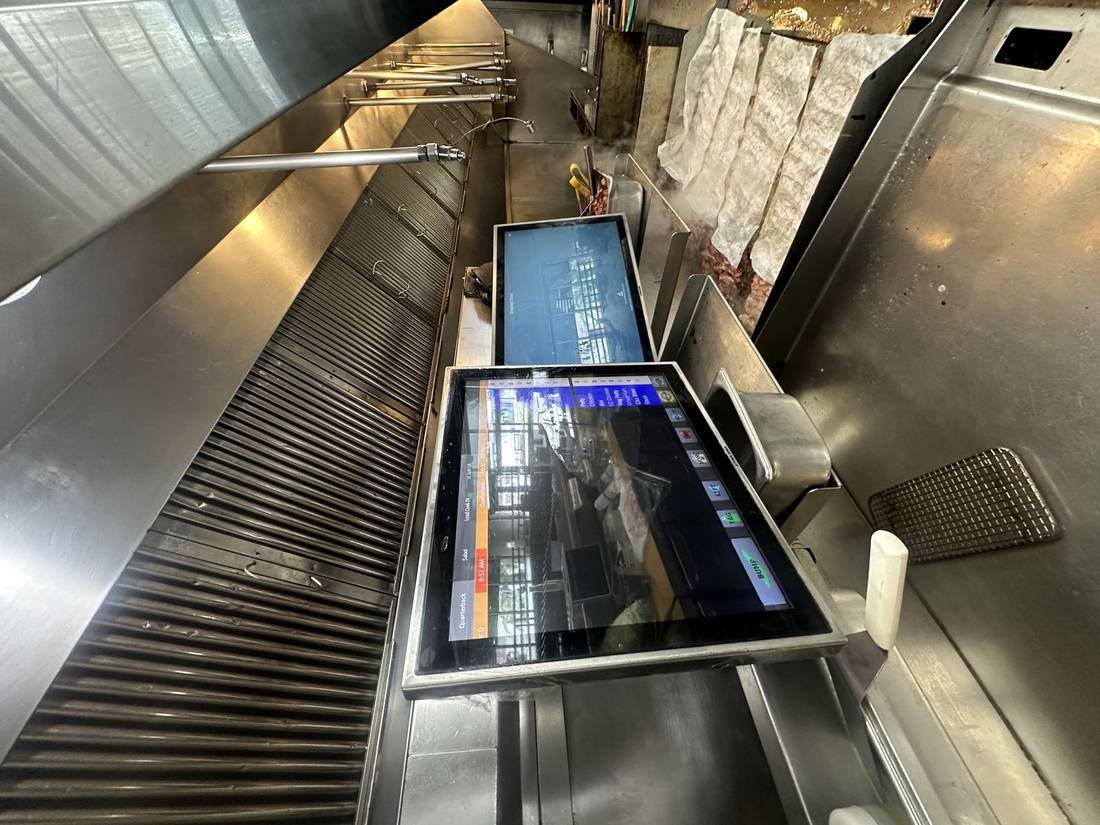 Order and kitchen display screens installed on a service line